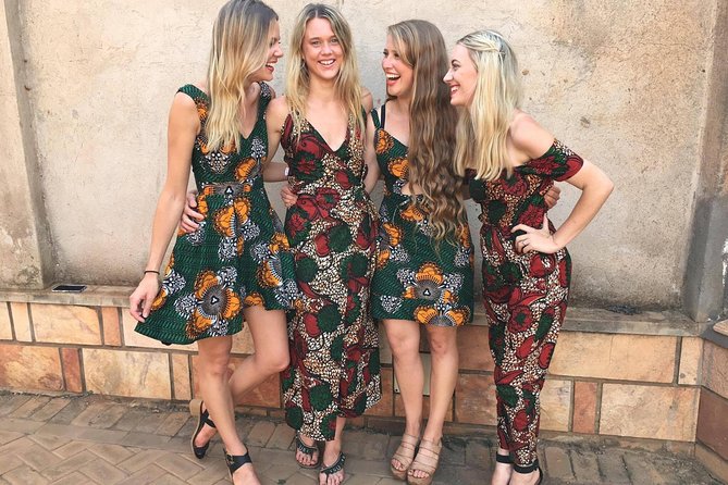 Custom African Wear Consultation - Choosing between kitenge, linen, and suiting fabric
