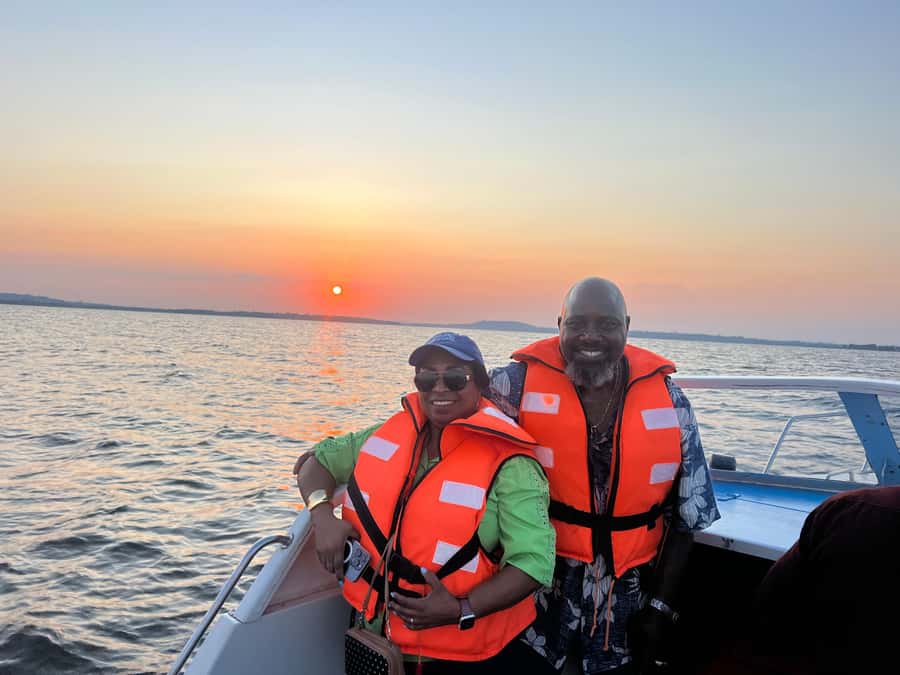 Entebbe: Equatar Line Tour & Victoria Lake Sunset Boat Ride - A boat cruise with birds, islands, and working lake life