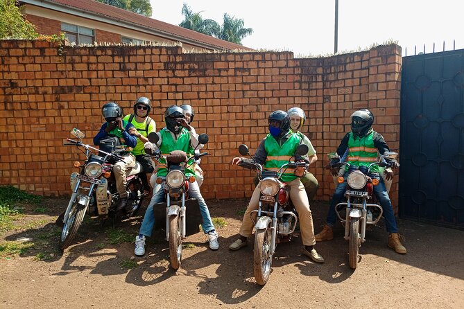 Kampala boda boda tours [motorbike tours]. - Kalerwe Market: produce, meat, and the working city