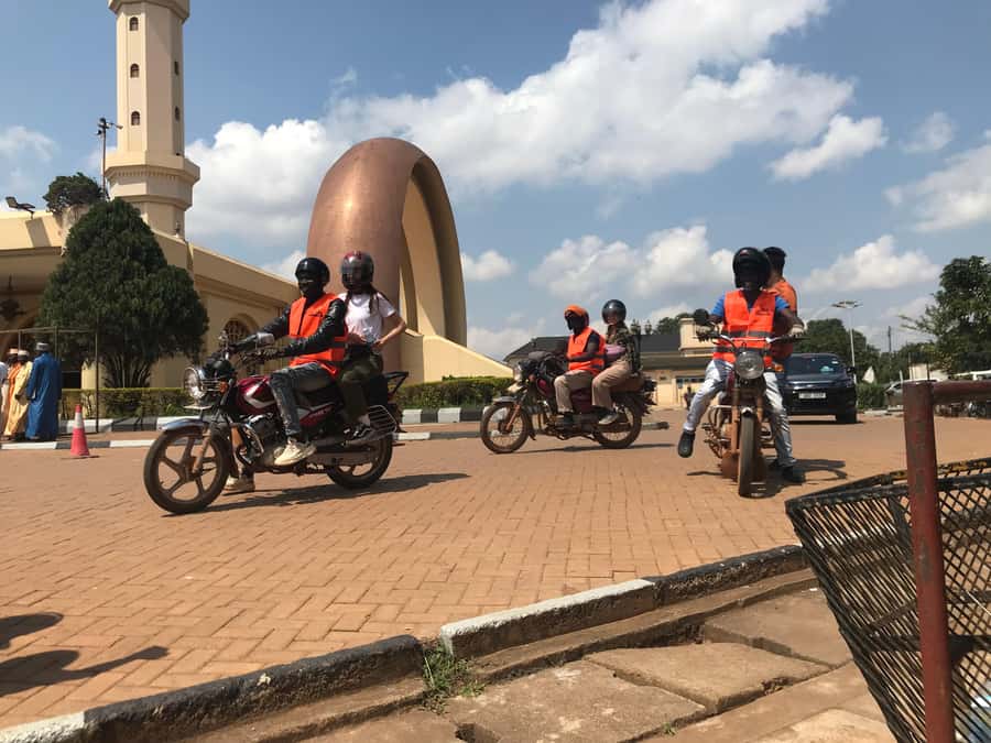 KAMPALA MOTOR BIKE TOURS (boda boda tours) - Owino Market, where the city gets practical