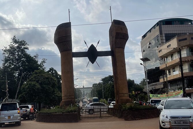 Safe Motorbike Tour in Kampala (Boda Boda Tour) - Tasting a Kampala classic at Owino Market
